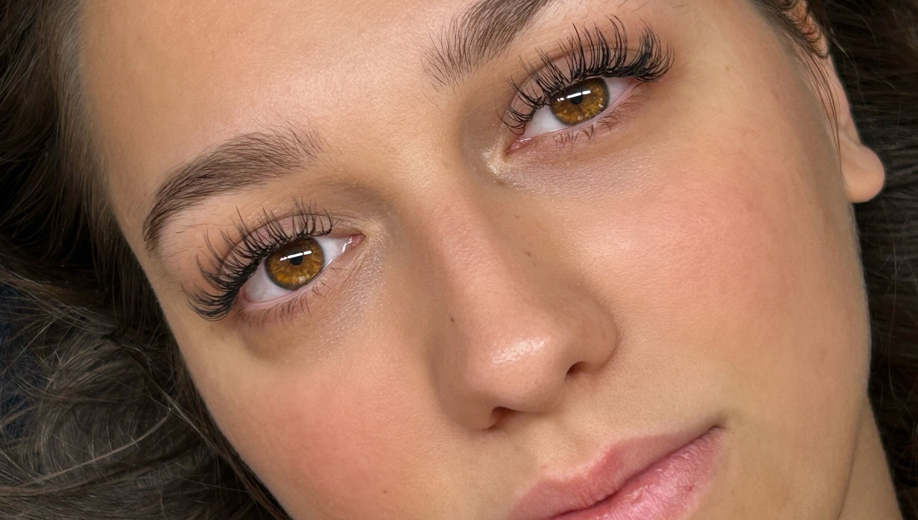 Close-up of eyelash extensions at Lashed by Linz, Basingstoke, England, GB showcasing natural beauty enhancement.
