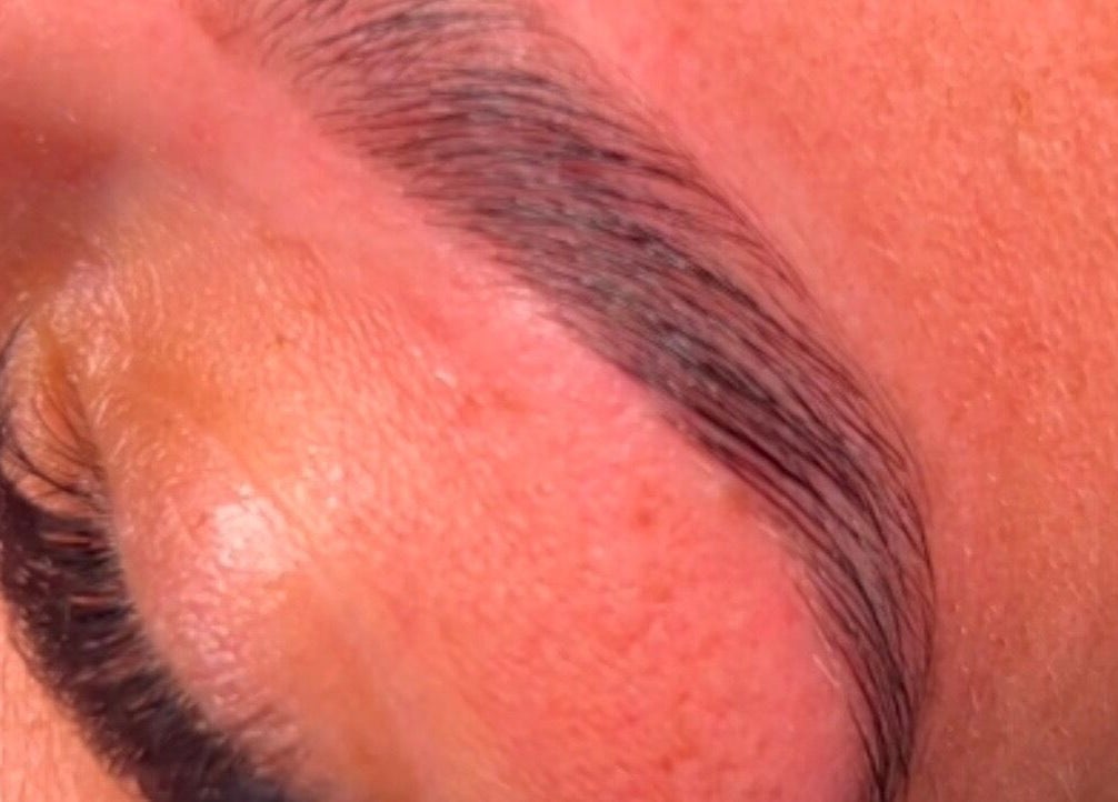 Perfectly shaped eyebrow with lashes at Lashed by Linz, Basingstoke, England, GB.