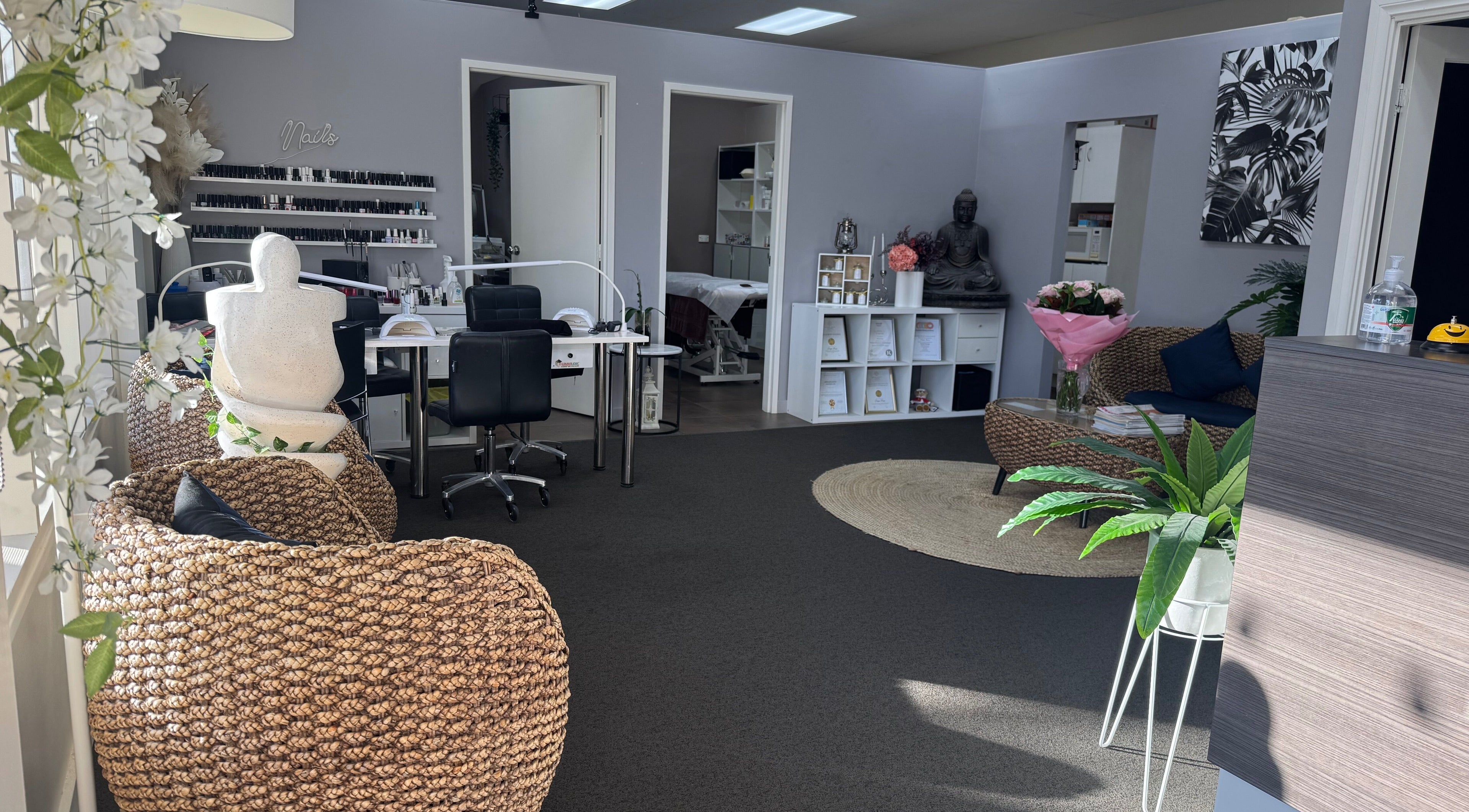 Cozy interior of Deera Spa and Beauty, Goodwood, South Australia, AU. Featuring wicker chairs and nail station.