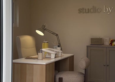 Cozy nail desk setup at Studio by Abigail, Coatbridge, Scotland, GB, showcasing a modern wellness atmosphere.