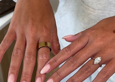 Polished hands with rings showcasing a sophisticated manicure at studio by Abigail, Coatbridge, Scotland, GB.