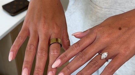 Polished hands with rings showcasing a sophisticated manicure at studio by Abigail, Coatbridge, Scotland, GB.