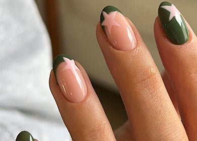 Elegant star-themed nail art at studio by abigail, Coatbridge, Scotland, GB, showcasing trendy green and pink design.