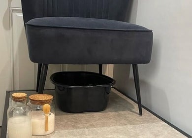 Foot spa setup at Jess Palmer Beauty, Bridgwater, England with comfortable chair and foot bath essentials.