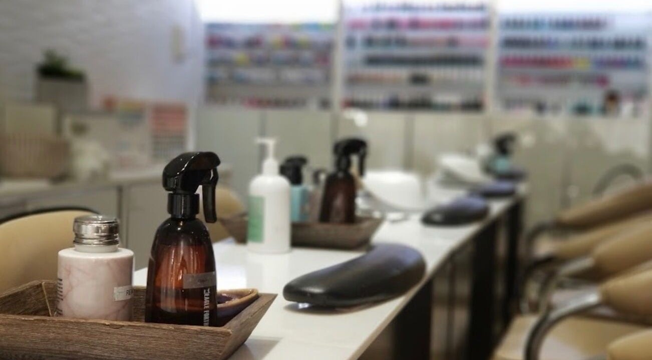 Interior view of The Grace NYC Nail Art, featuring elegant nail stations in New York, New York, US.