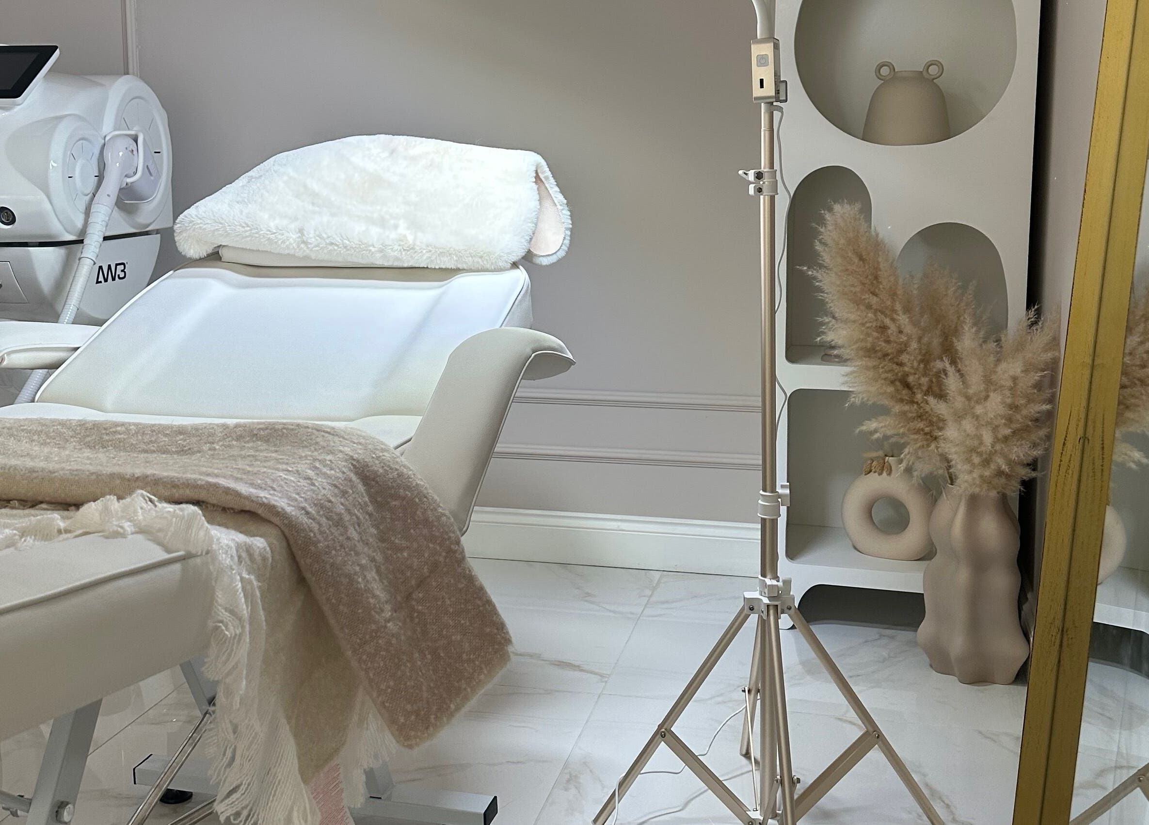 Relaxing treatment room at Selin Aesthetics in Stoke-on-Trent, England, GB, featuring a plush treatment chair.