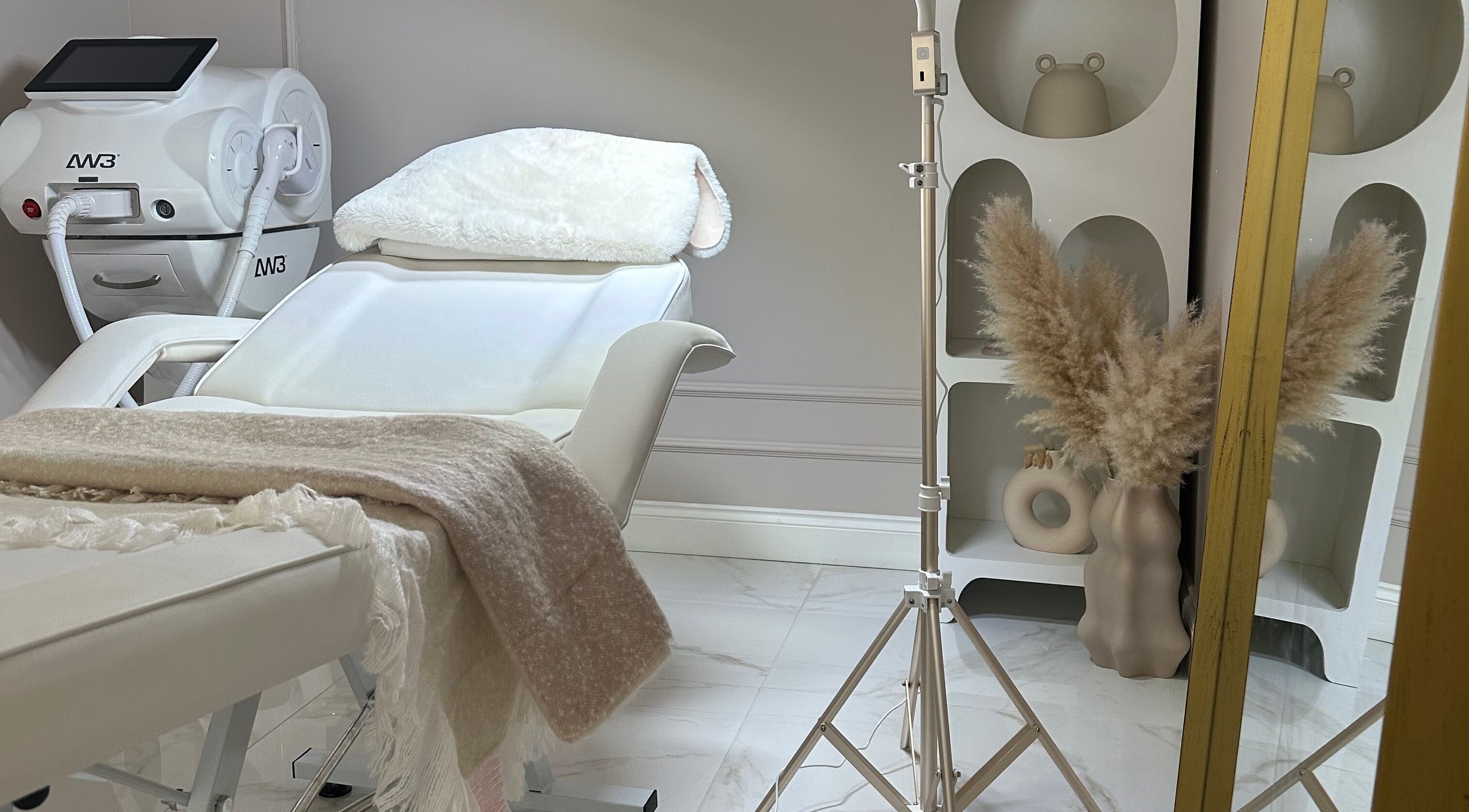 Relaxing treatment room at Selin Aesthetics in Stoke-on-Trent, England, GB, featuring a plush treatment chair.