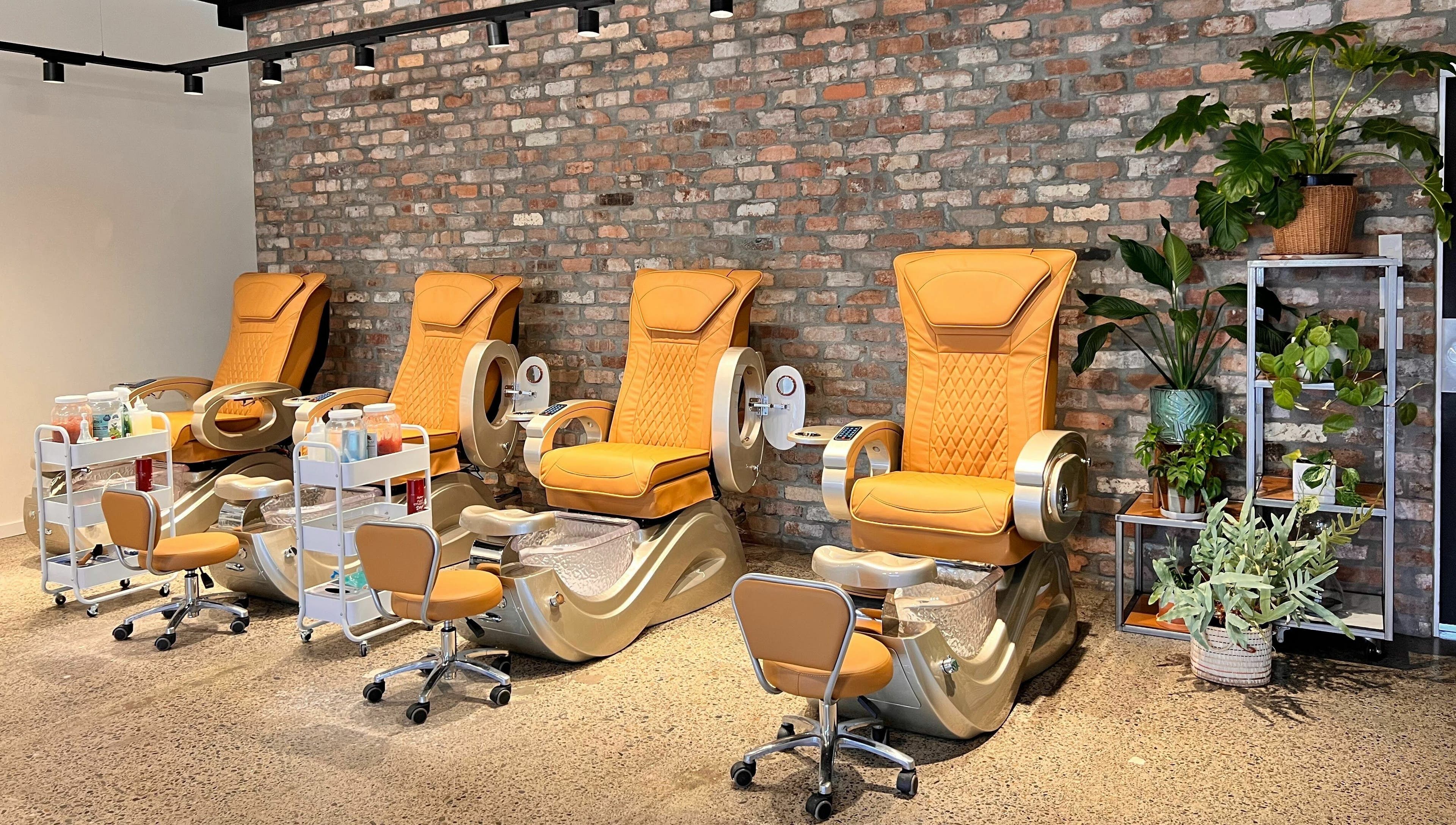 Luxurious pedicure chairs at The Nail Studio, Taupō, Waikato, NZ, offering comfort and style in a chic setting.