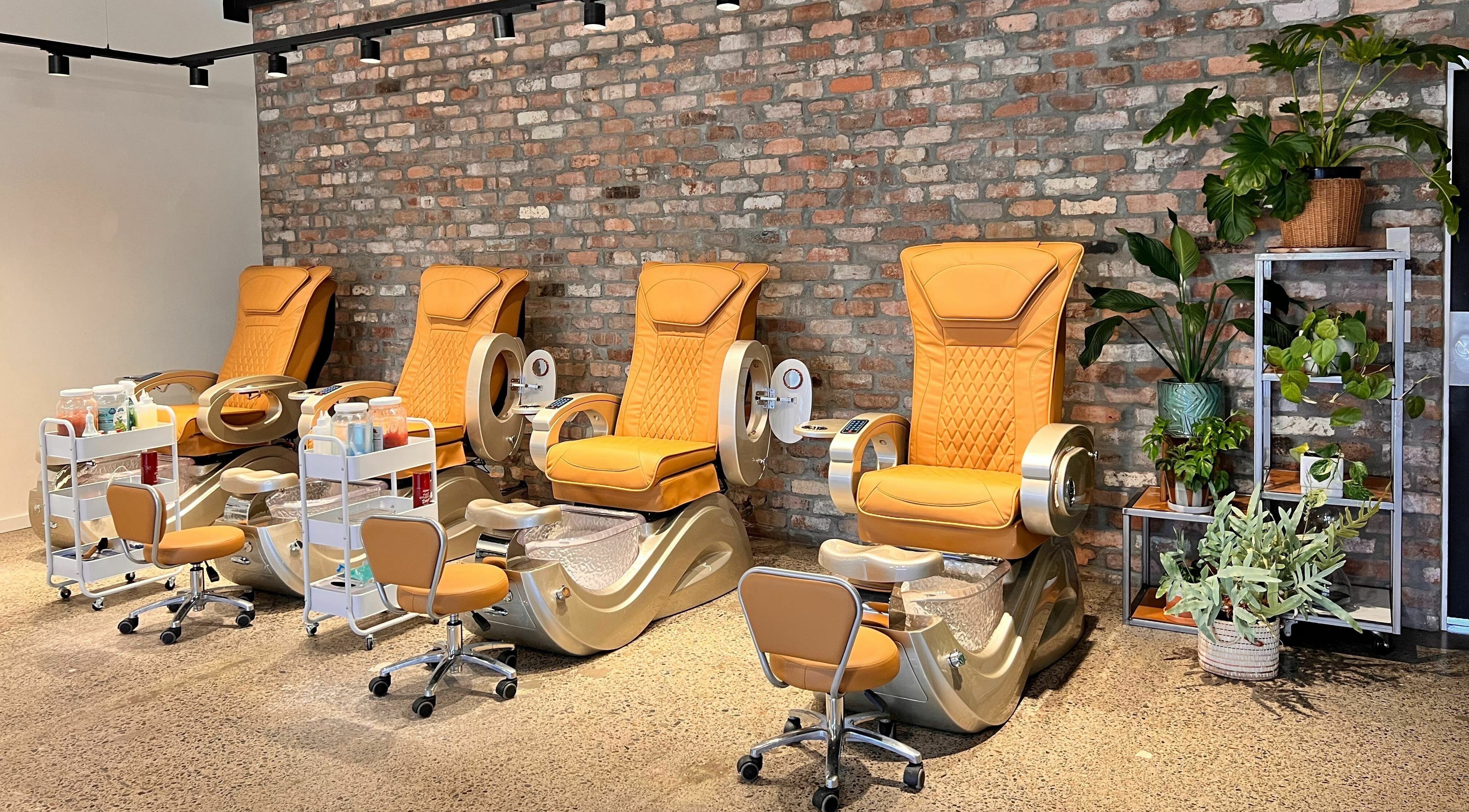 Luxurious pedicure chairs at The Nail Studio, Taupō, Waikato, NZ, offering comfort and style in a chic setting.