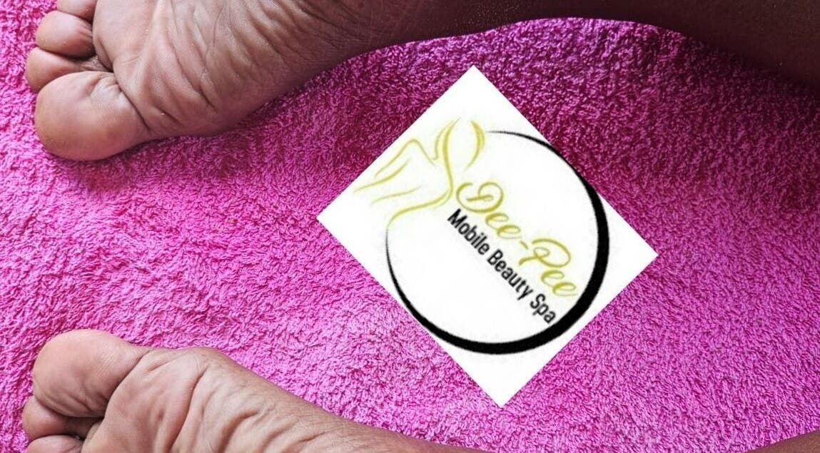 Relaxing foot treatment at Deepee Mobile Beauty Spa, Kuruman, Northern Cape, ZA on plush pink towel.