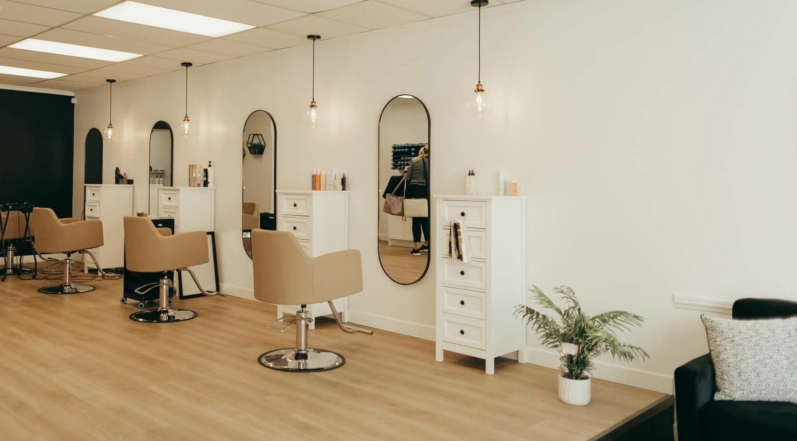 Modern salon interior at Blonde Design Co., Mount Forest, Ontario, CA showcasing sleek design and comfort.