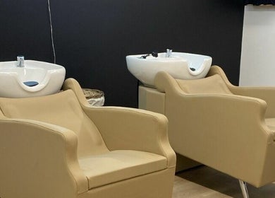 Comfortable salon chairs and washing stations at Blonde Design Co., Mount Forest, Ontario, CA.