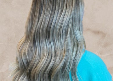 Lustrous blonde hair waves styled at Blonde Design Co., Mount Forest, Ontario, CA.
