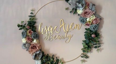 Lisa Aien Beauty floral sign in Edinburgh, Scotland, GB, featuring elegant roses and greenery on a soft backdrop.