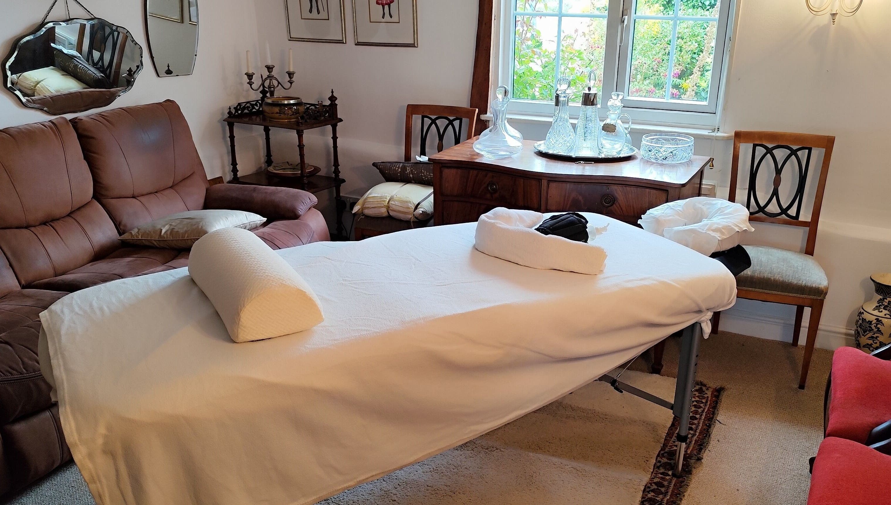 Relaxing massage setup at MP's Mobile Massages in Ipswich, GB, featuring a cozy treatment table.