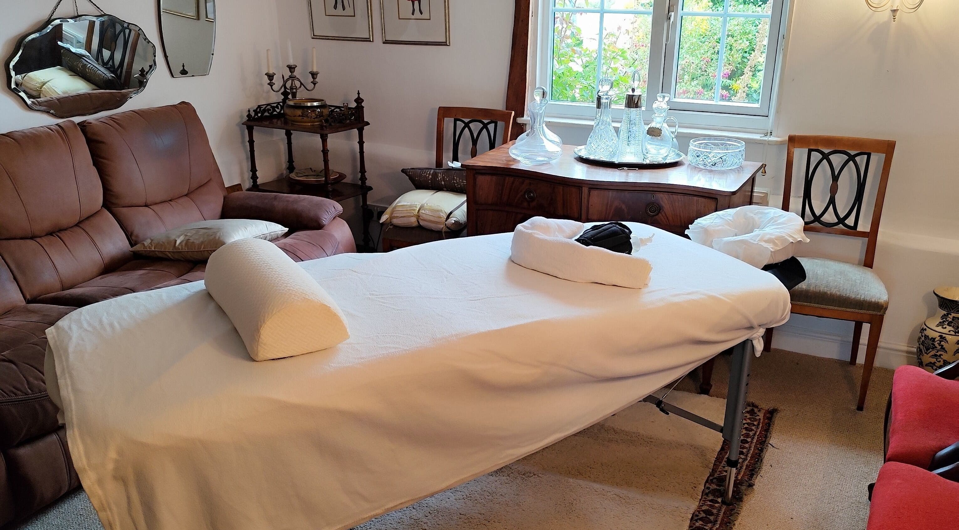 Relaxing massage setup at MP's Mobile Massages in Ipswich, GB, featuring a cozy treatment table.