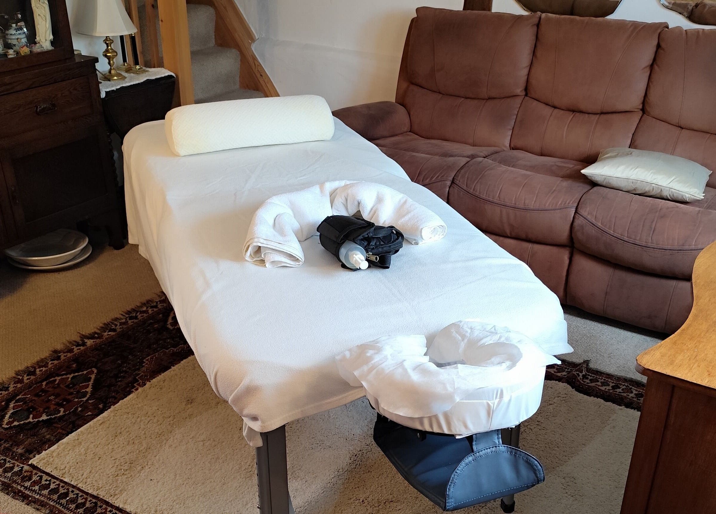 Massage table at MP's Mobile Massages, cozy setting in Ipswich, GB for a relaxing session.