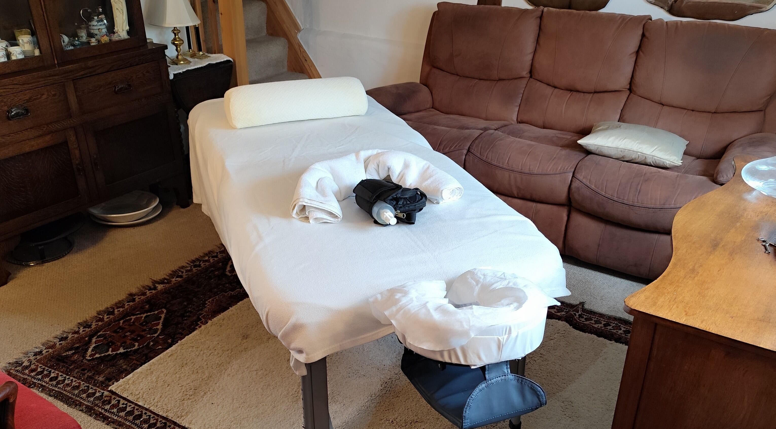 Massage table at MP's Mobile Massages, cozy setting in Ipswich, GB for a relaxing session.