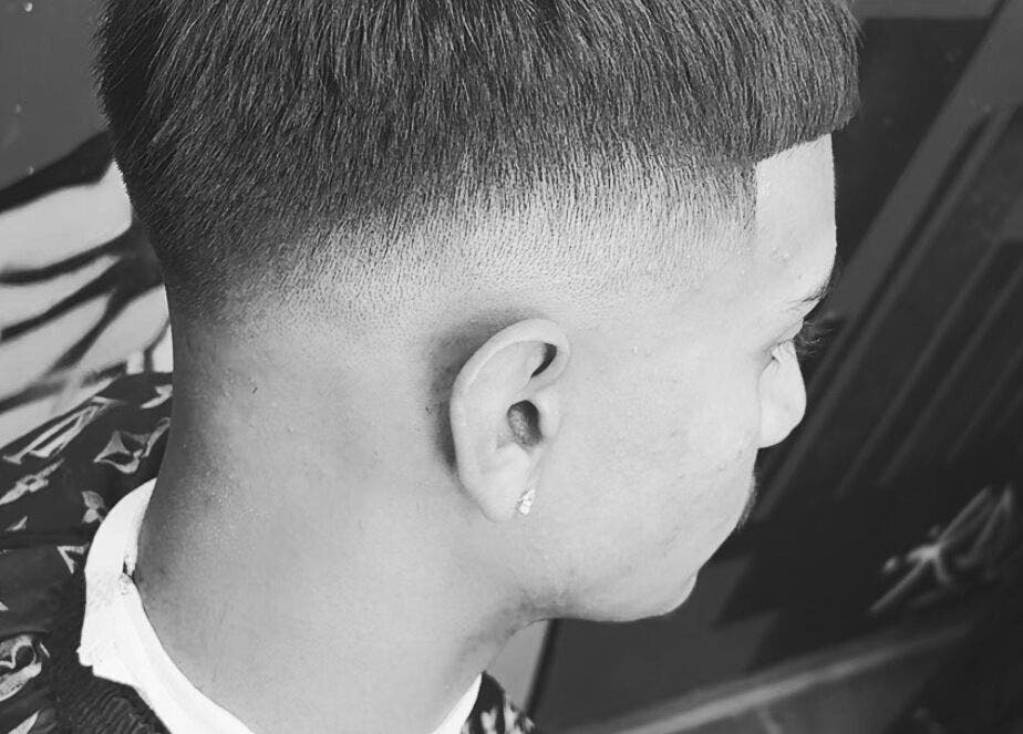 Close-up of a fresh fade haircut at Kd.Cutzz, Surrey, British Columbia, CA, showcasing precision styling.