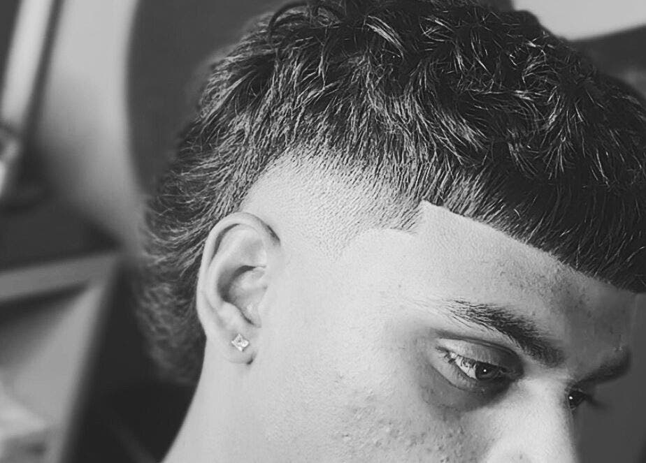Close-up of a trendy hairstyle at Kd.Cutzz in Surrey, British Columbia, CA.