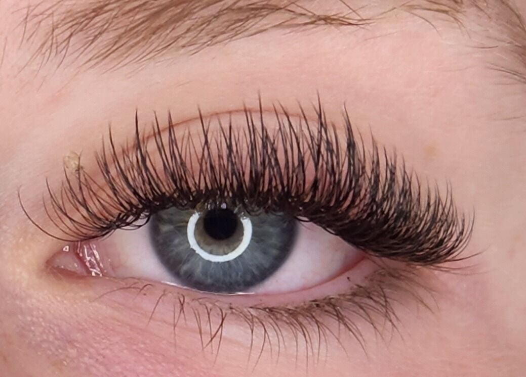 Close-up of eyelash extensions at On The Fly Lashes, Latrobe, Tasmania, AU showcasing lush and voluminous lashes.