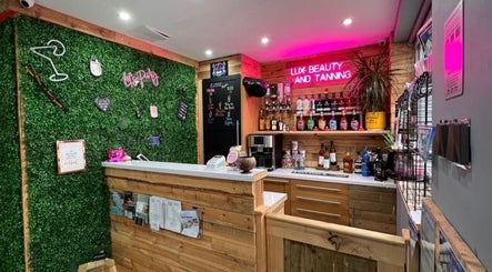 Modern interior of Nails by Liz with vibrant bar setup in Leabrooks, England, GB.