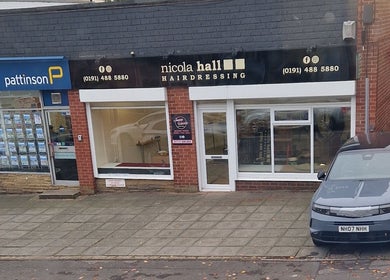 The storefront near Jenna's Holistic Beauty Room in Whickham, England, GB with visible signage.