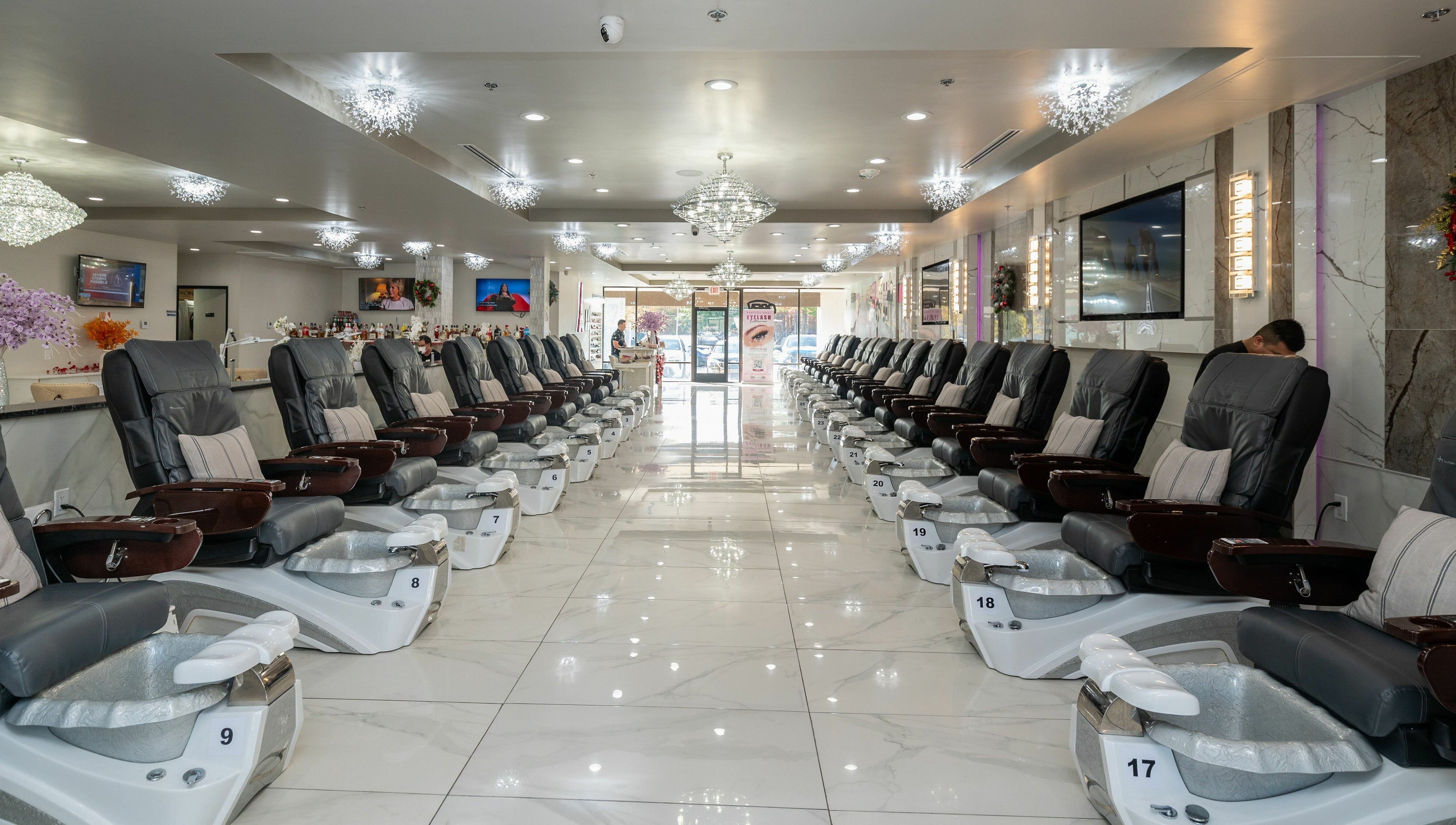 Luxury pedicure chairs at French Nails Luxury Spa and Bar in Dallas, Texas, US, offering ultimate relaxation.