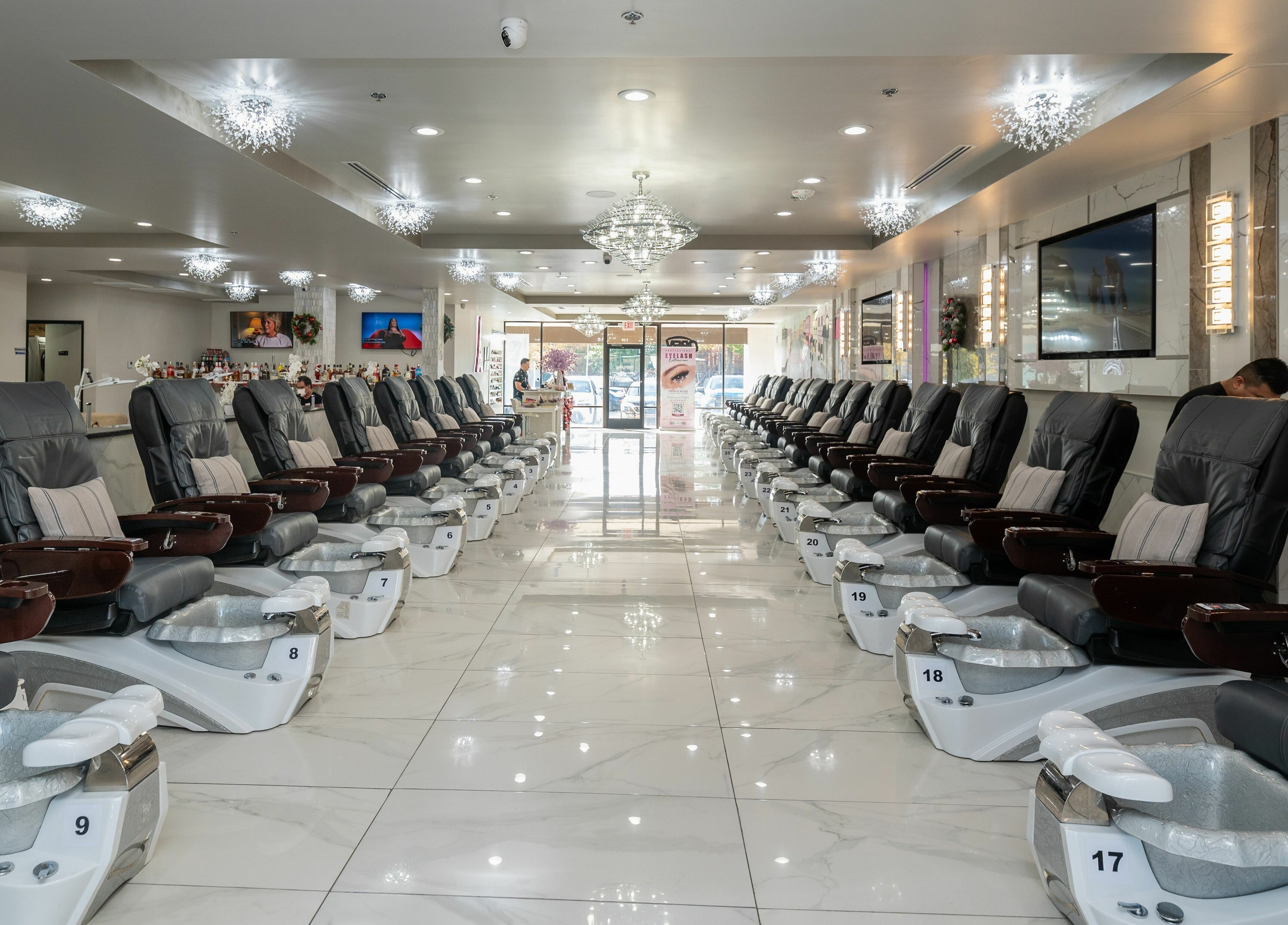 Luxury pedicure chairs at French Nails Luxury Spa and Bar in Dallas, Texas, US, offering ultimate relaxation.
