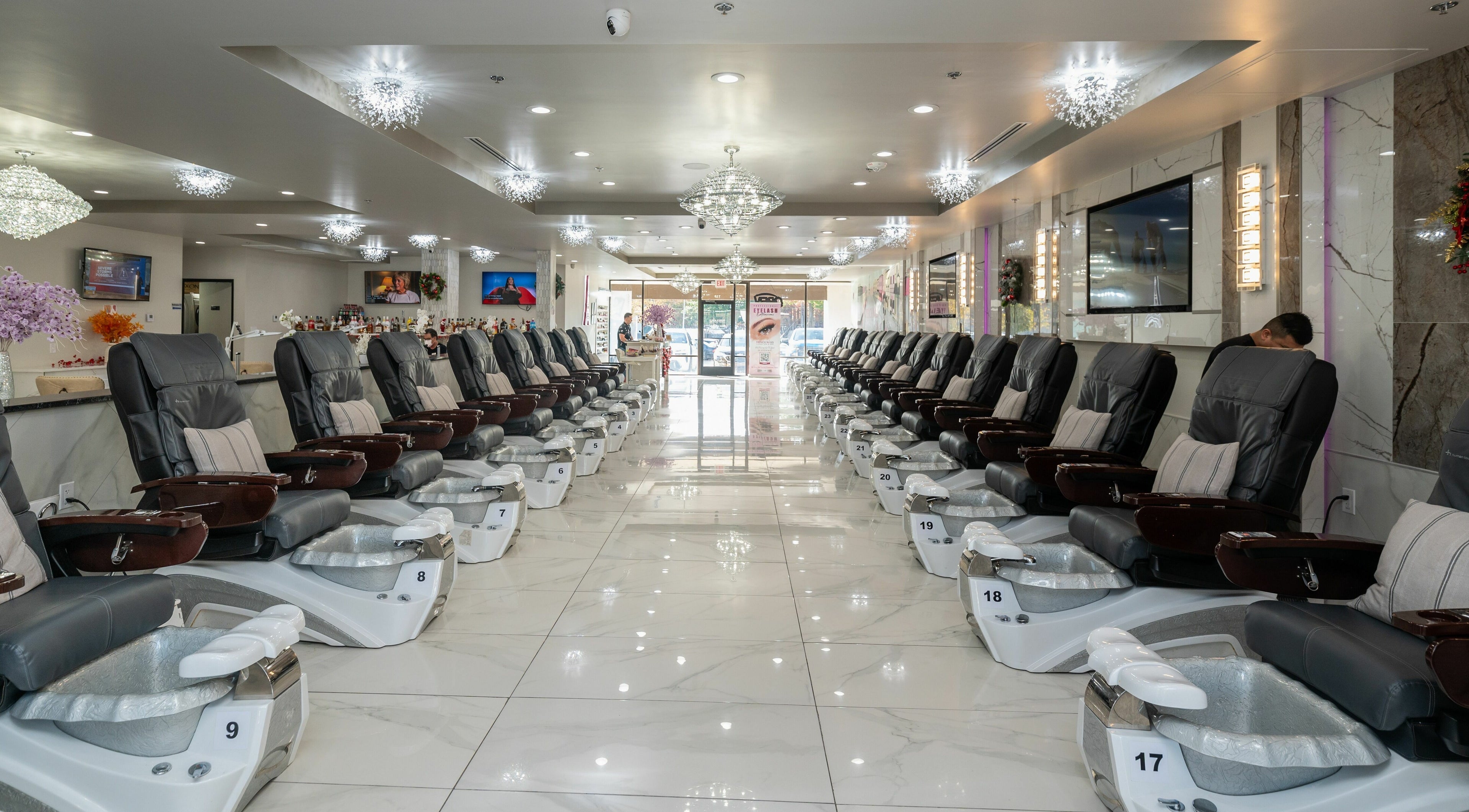 Luxury pedicure chairs at French Nails Luxury Spa and Bar in Dallas, Texas, US, offering ultimate relaxation.