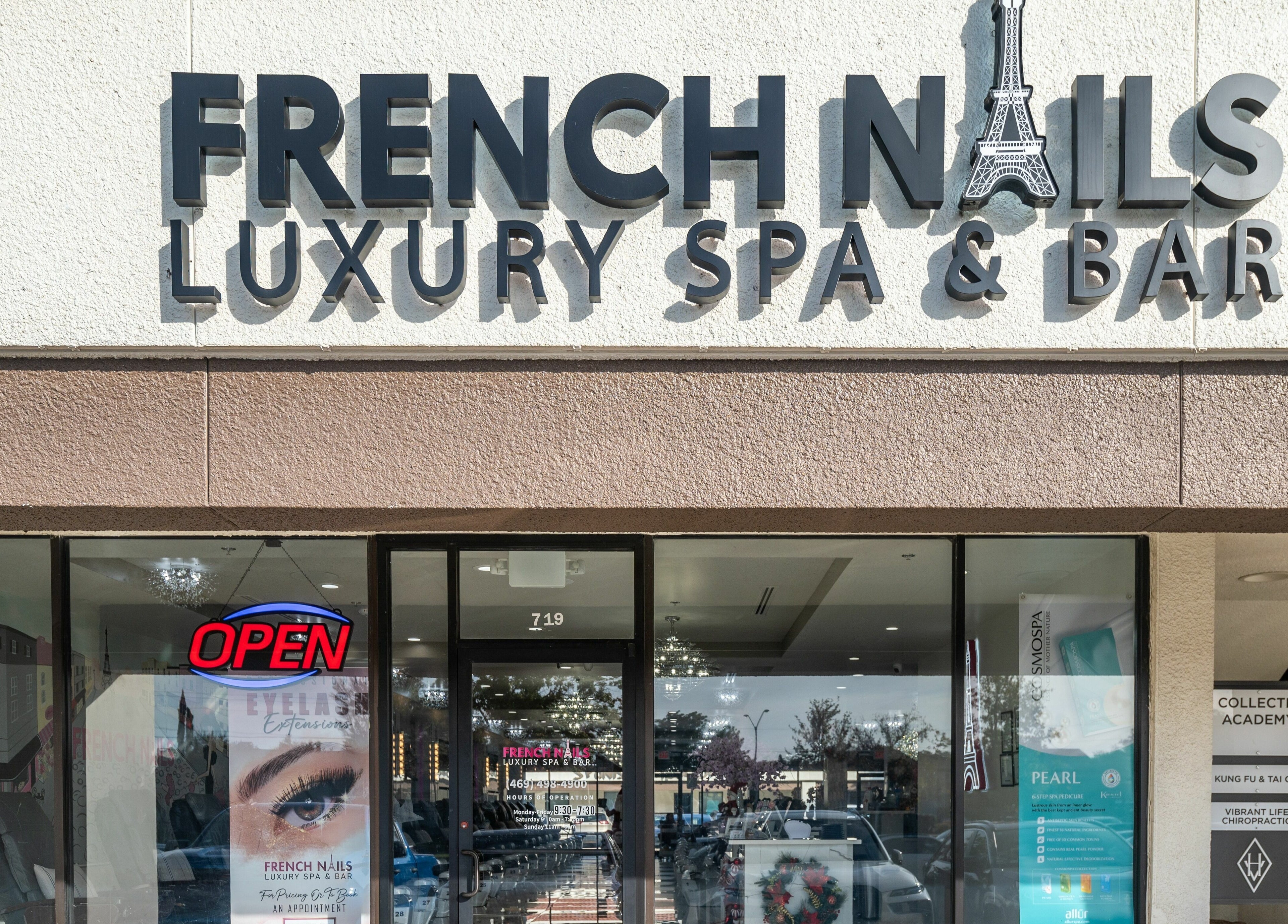 Entrance of French Nails Luxury Spa and Bar in Dallas, Texas, US, showcasing the modern exterior design.