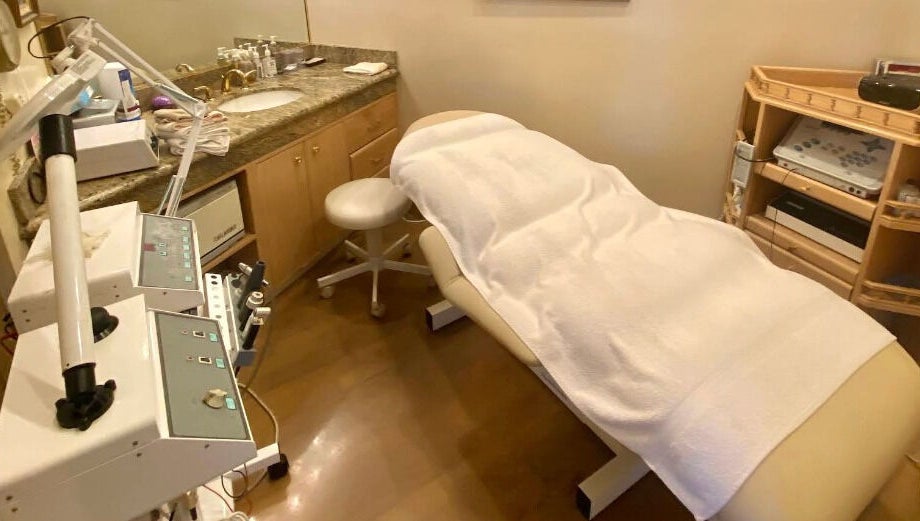 Relaxing treatment room at Classy Hair Salon in Gardena, California, US, with modern equipment and cozy ambiance.