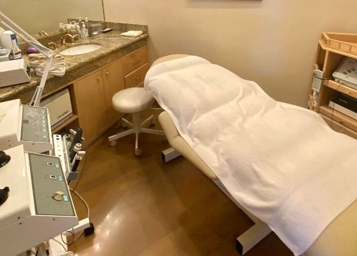 Relaxing treatment room at Classy Hair Salon in Gardena, California, US, with modern equipment and cozy ambiance.