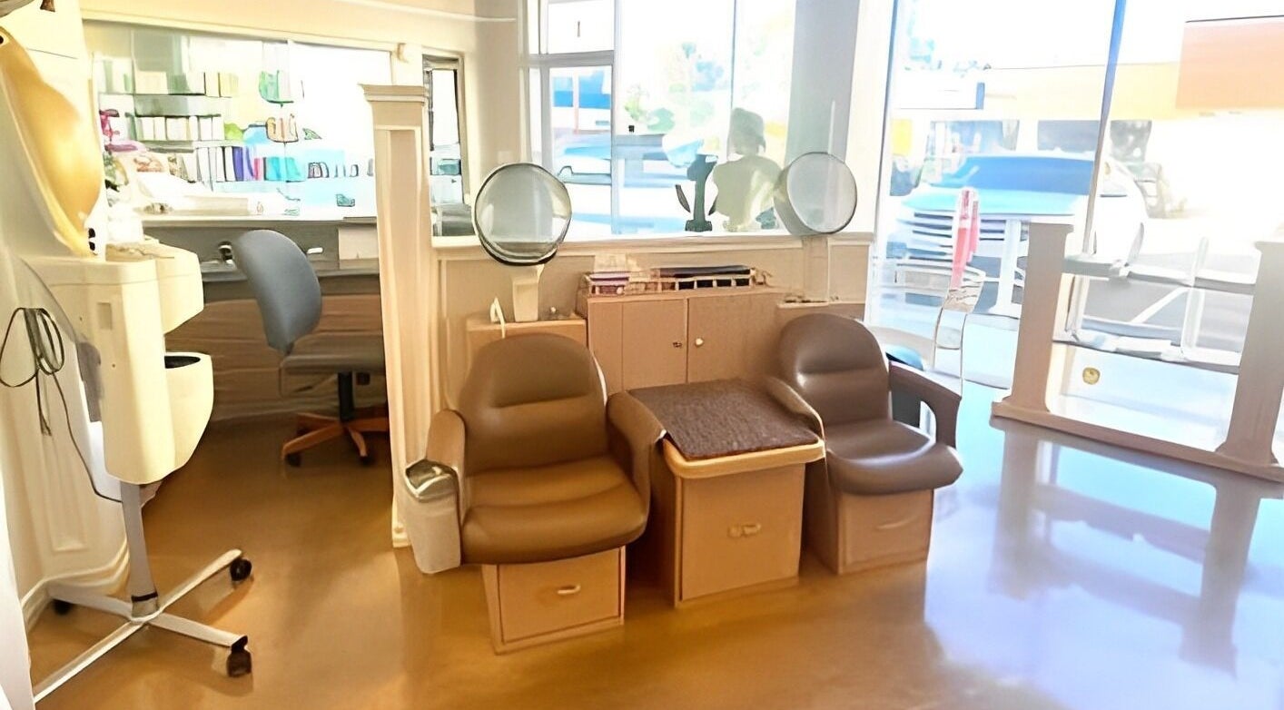 Cozy seating area at Classy Hair Salon in Gardena, California, US, with modern amenities and ample lighting.