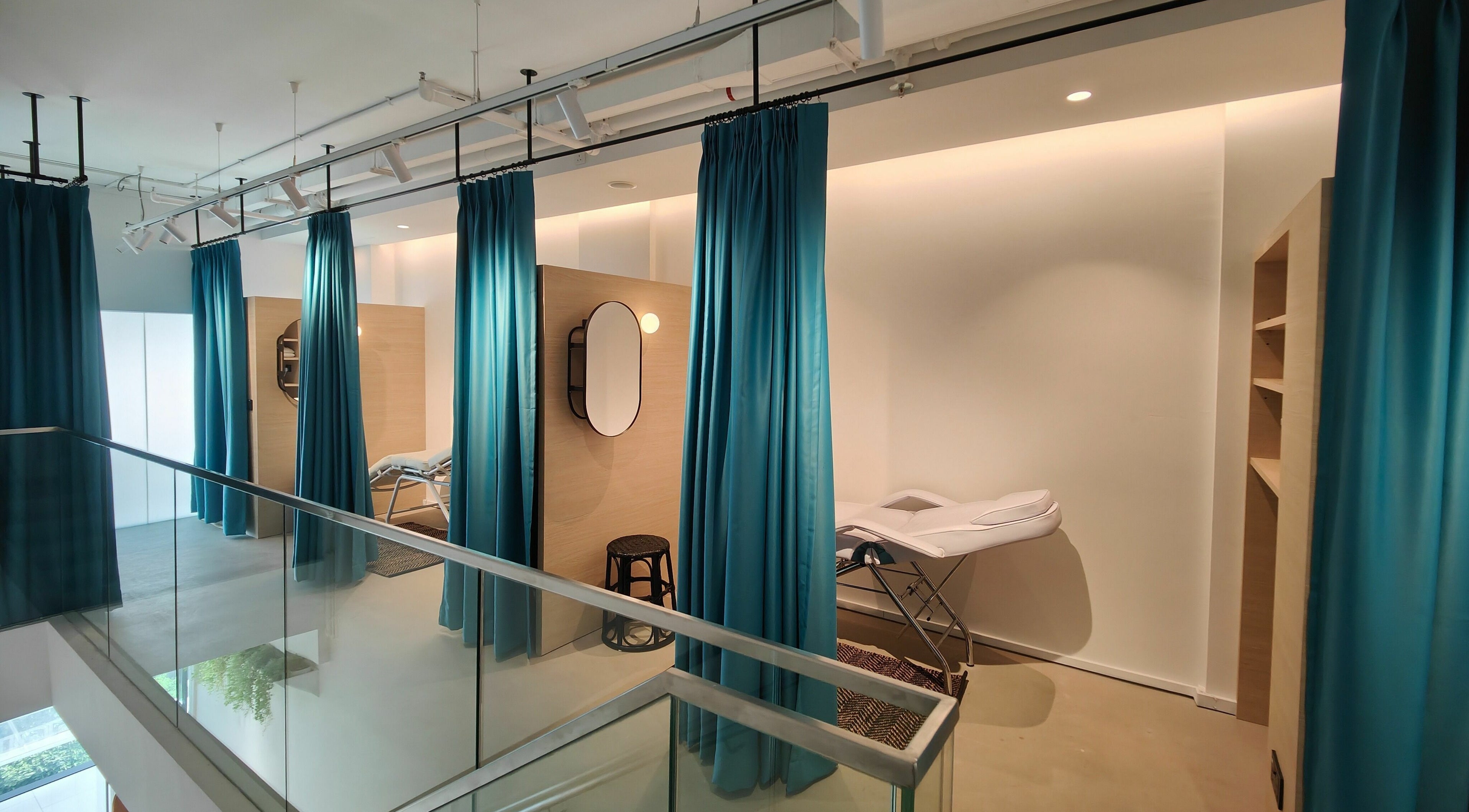 Luxurious treatment rooms with blue curtains at TCL Beauty Studio, Singapore, Singapore, SG.