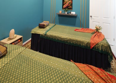 Cozy massage room at Naree Thai Massage, Auckland, NZ with traditional decor and soothing ambiance.