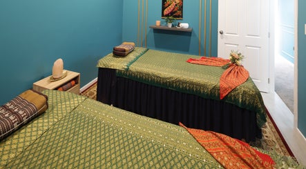 Cozy massage room at Naree Thai Massage, Auckland, NZ with traditional decor and soothing ambiance.