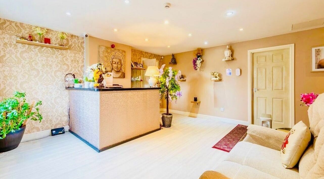 Calm reception at Sabai Thai Massage Therapy in Talbot Green, Wales, GB, featuring elegant decor and tranquil lighting.