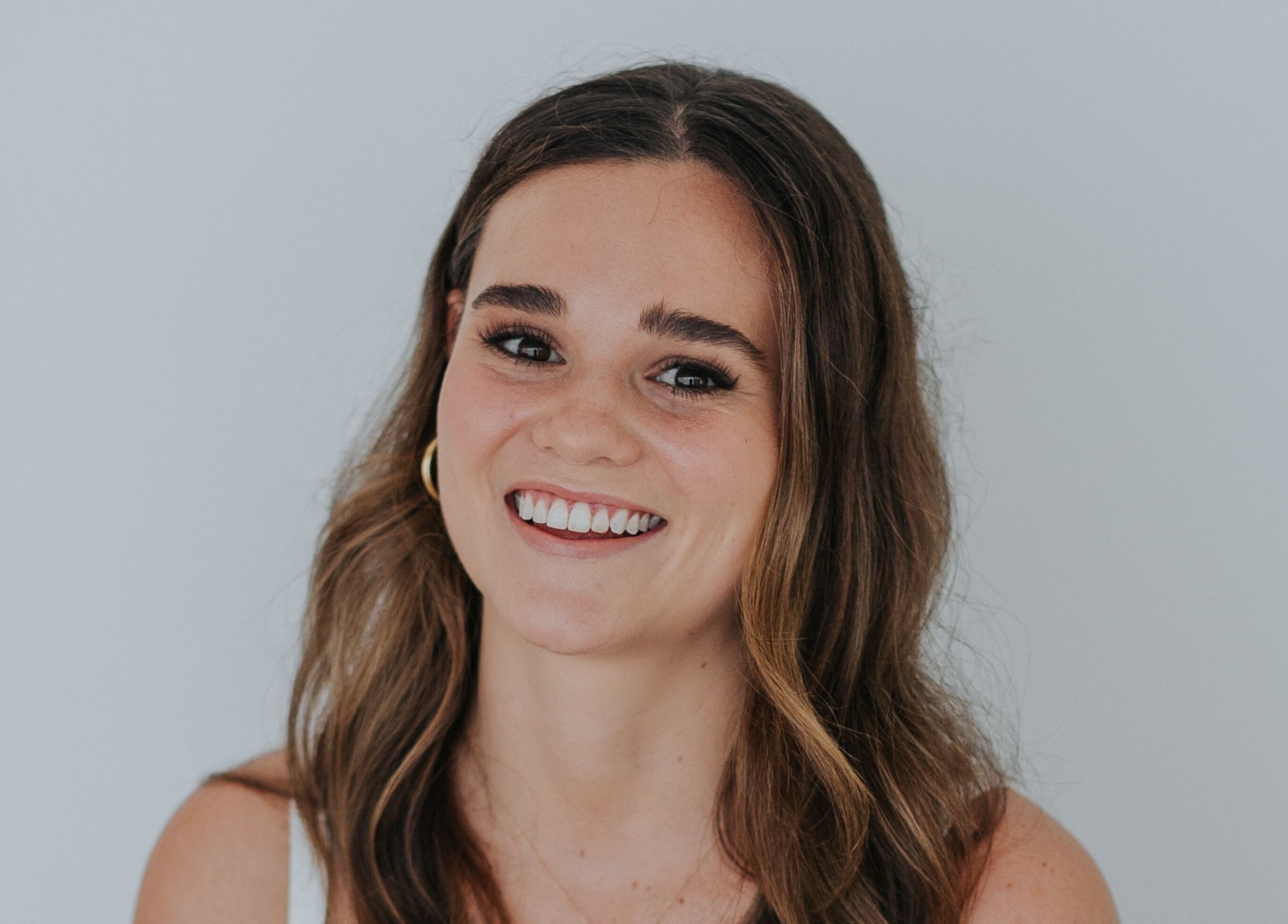 Happy individual smiling at Tory Wells, Mascot, New South Wales, AU, showcasing beauty and wellness results.