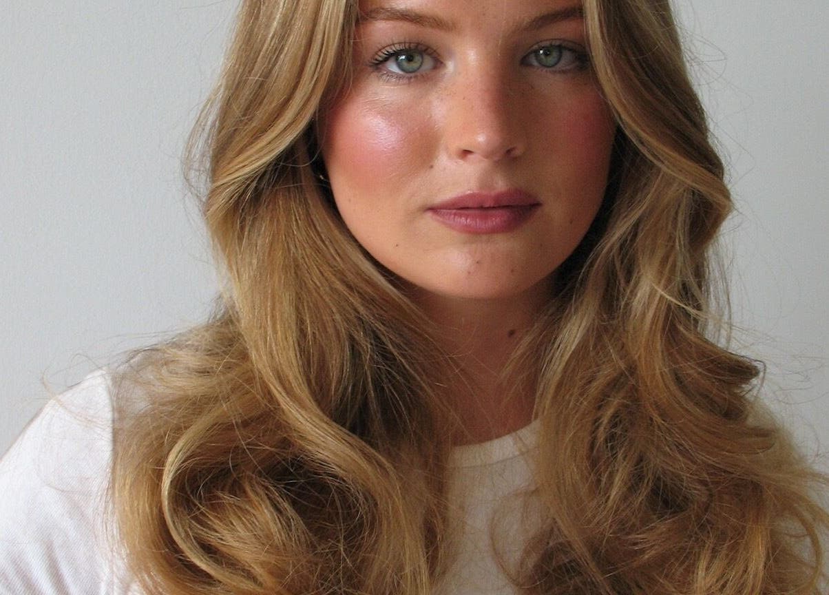 Woman with styled wavy hair at Tory Wells, Mascot, New South Wales, AU.