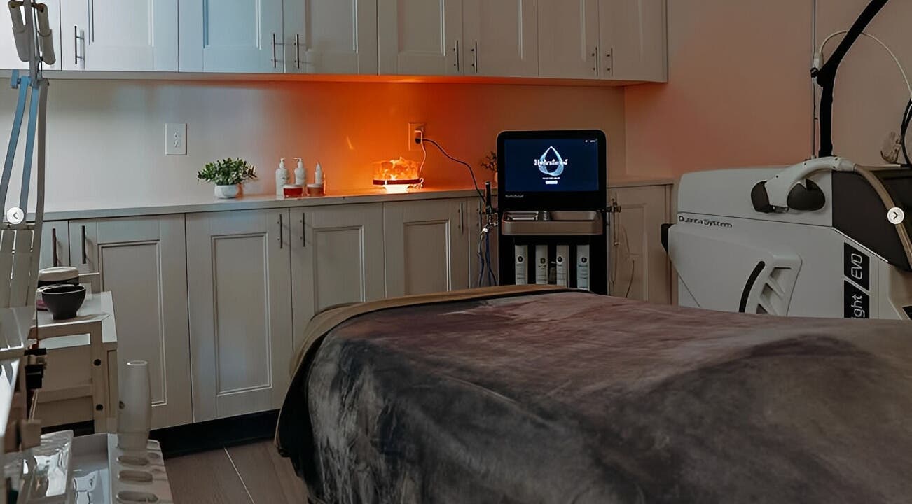 Elegant spa room at Vogue Lashes & Spa - Great Bridge, Chesapeake, Virginia, US, with modern treatment equipment.