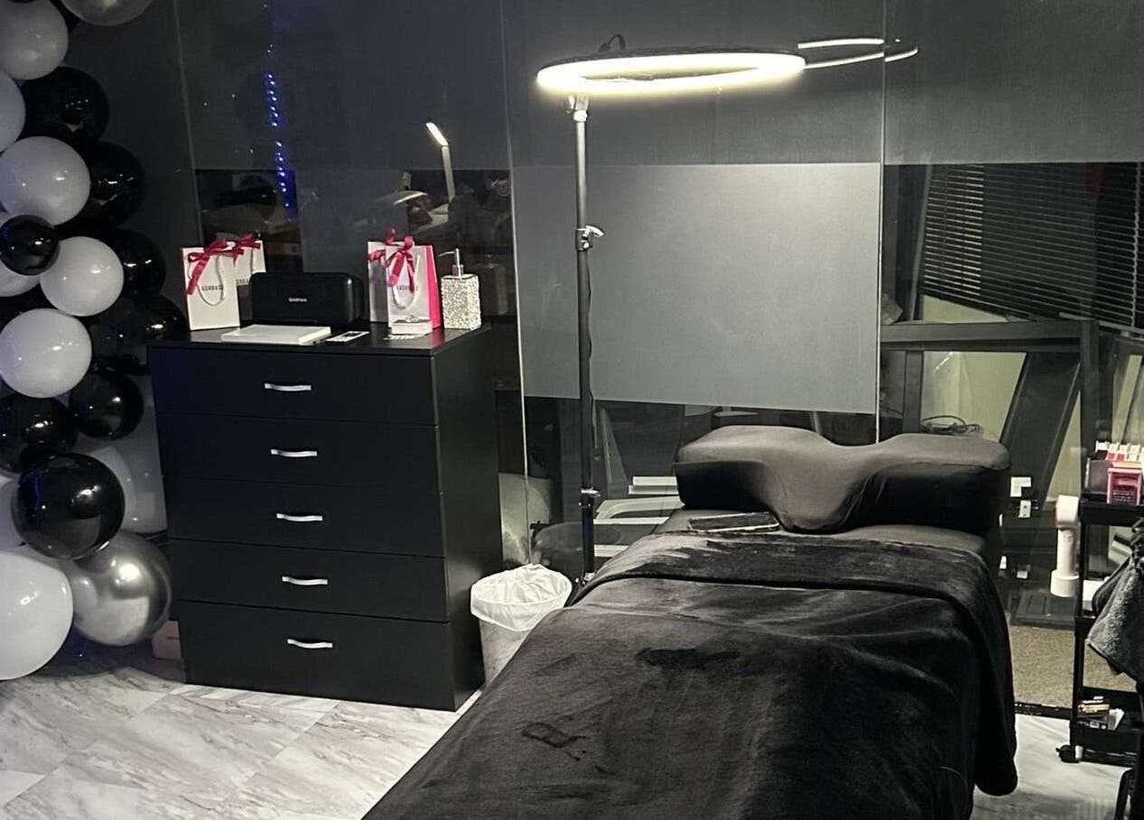 Lash’d aesthetics UK treatment room with black decor in Peterborough, England, GB.