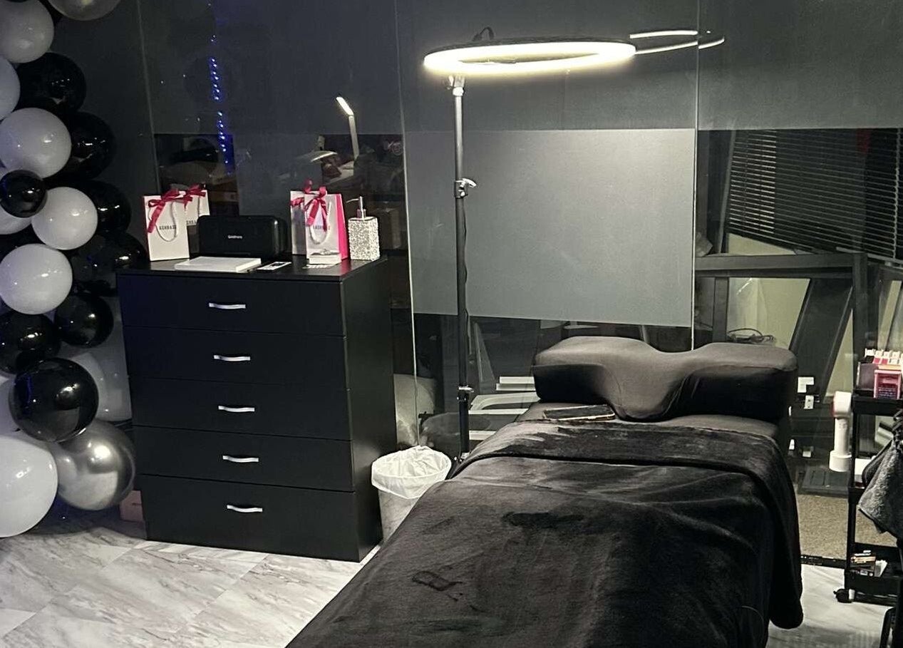 Lash’d aesthetics UK treatment room with black decor in Peterborough, England, GB.