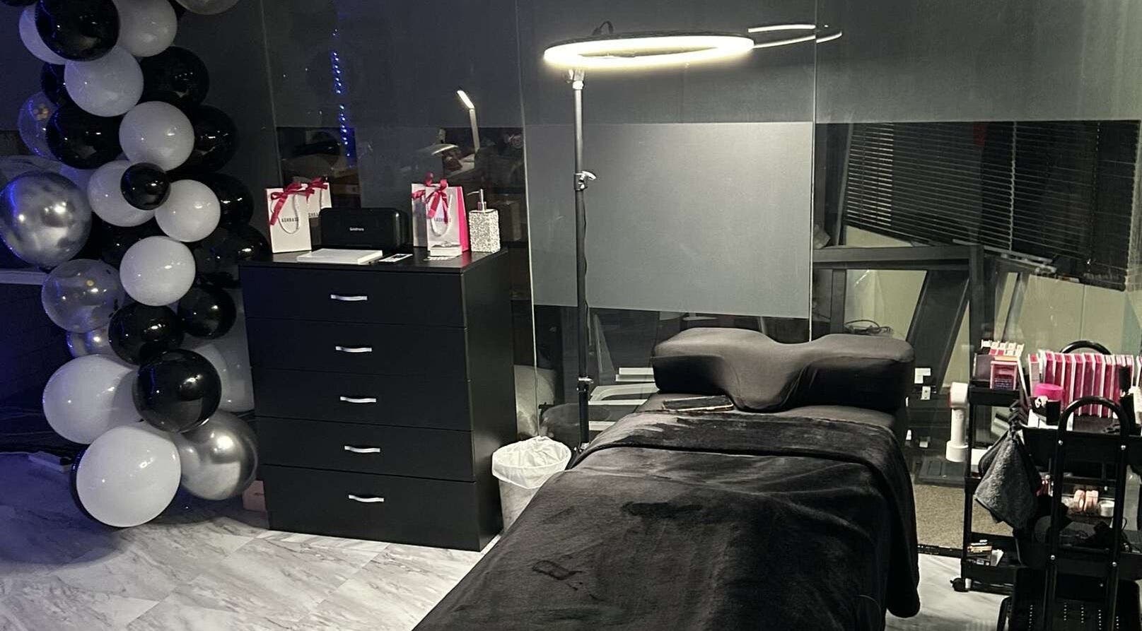Lash’d aesthetics UK treatment room with black decor in Peterborough, England, GB.