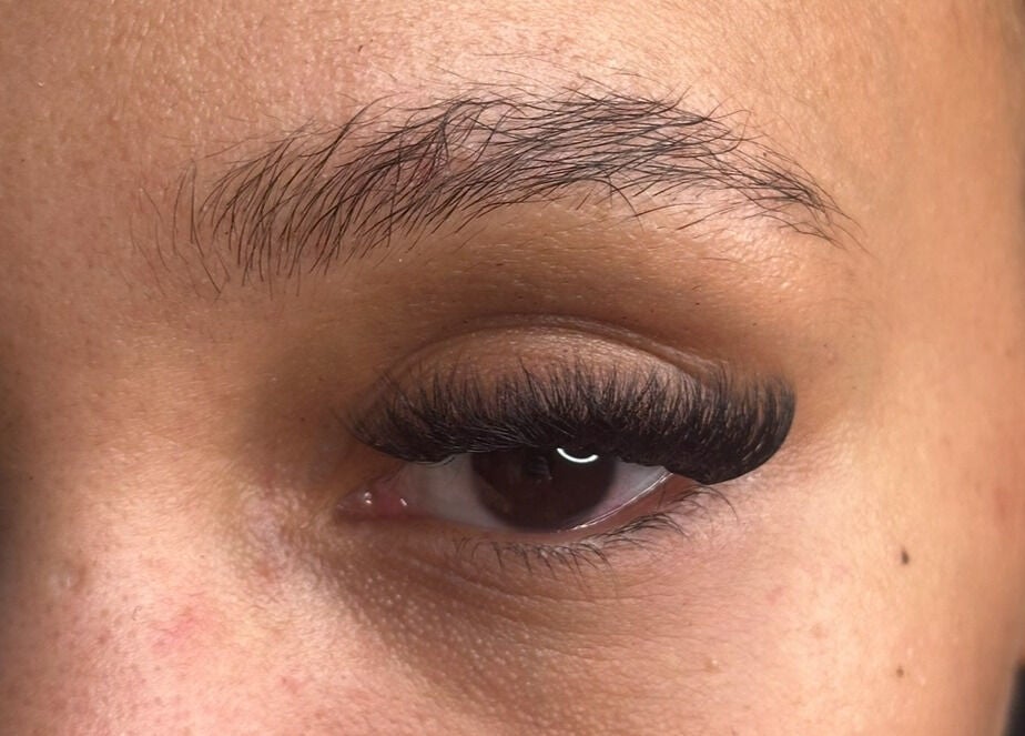 Close-up of expertly applied eyelash extensions at Lash’d aesthetics UK, Peterborough, England, GB.