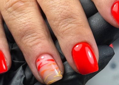 Bright red and orange nail art at Edit By ELM, Binfield, England, GB. Stunning nail designs for a chic look.