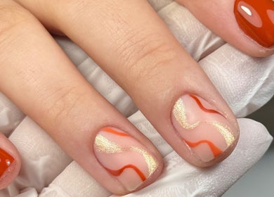 Elegant nail art with red and gold polish by Edit By ELM, Binfield, England, GB.
