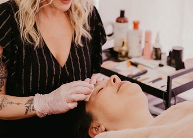 Aesthetician performing a facial at Get Up and Glow Beauty Studio, Chehalis, Washington, US.