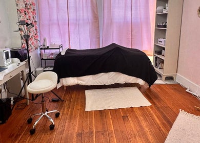 Tranquil treatment room at Get Up and Glow Beauty Studio in Chehalis, Washington, US with luxurious setup.