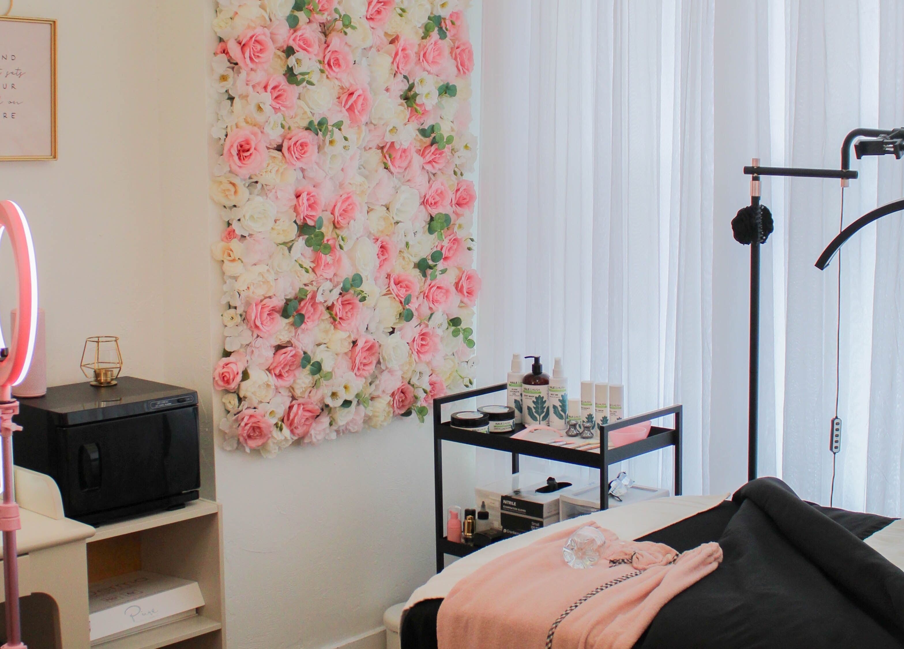 Relaxing treatment room at Get Up and Glow Beauty Studio, Chehalis, Washington, US, with floral decor.